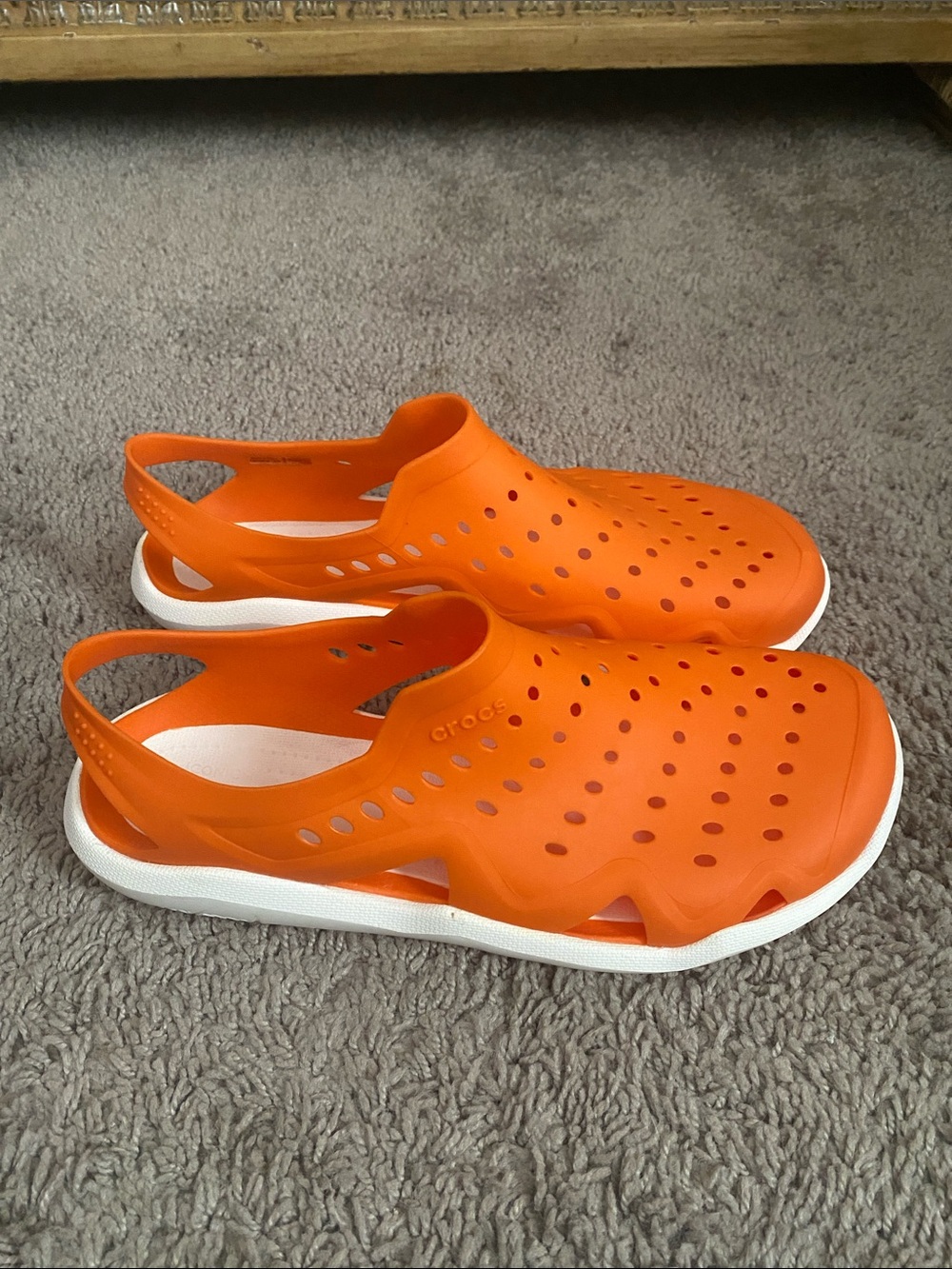 Iconic CROCS Men's Orange Vented Slip-On Sandals with White Soles